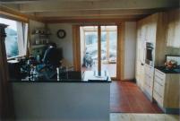Bild 4: Offener Küchenbereich mit Durchgang in Wintergarten
